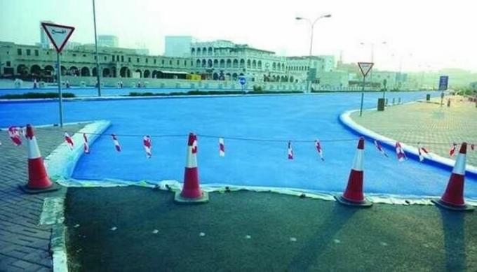 Warum Behörden Katar erfordern Malerei Asphalt in blau